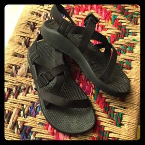 Black Chaco sandals.